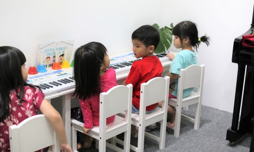 Joy Waltz Academy Piano Students learning music
